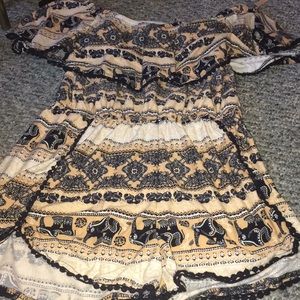 Cute over the shoulders romper.